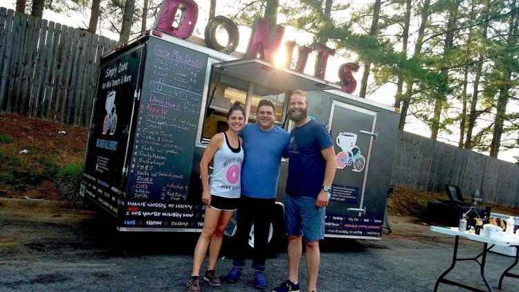 Our team standing by our food truck.