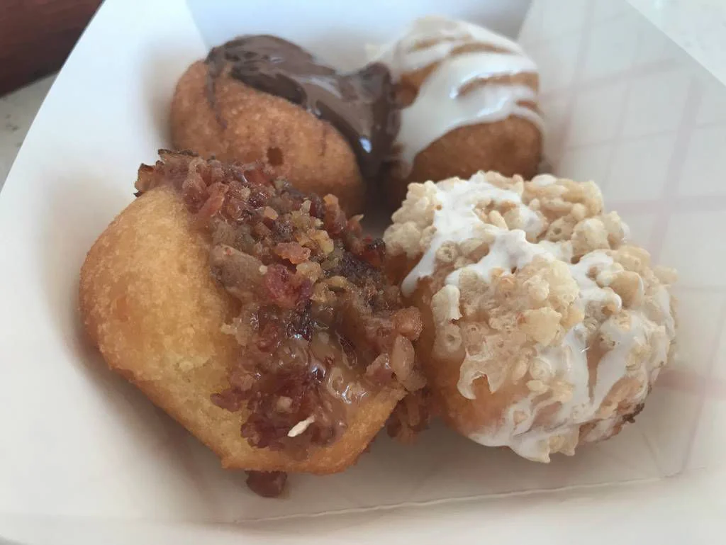 Basket of four covered donuts